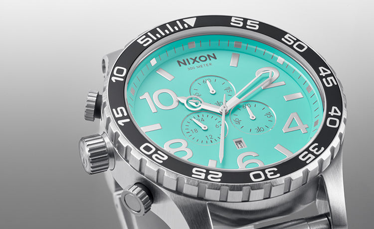 A close-up of various watch bezels, showcasing different styles and functionalities.