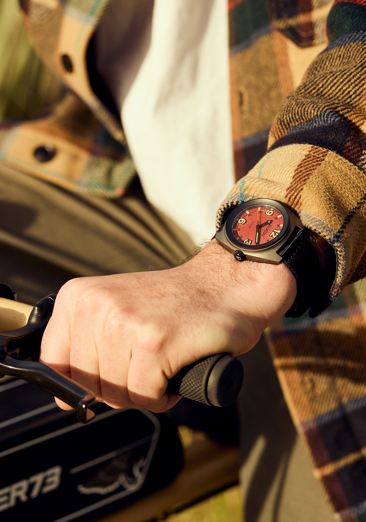 The Clutch 42 Nixon Watch on a man's wrist