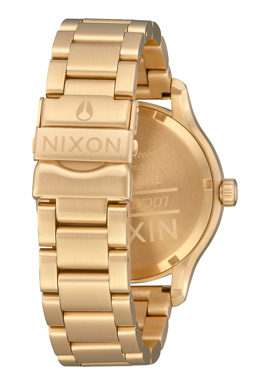Nixon 14k gold watch discount