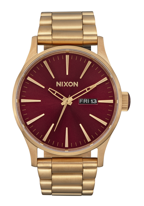 Nixon red sales face gold watch