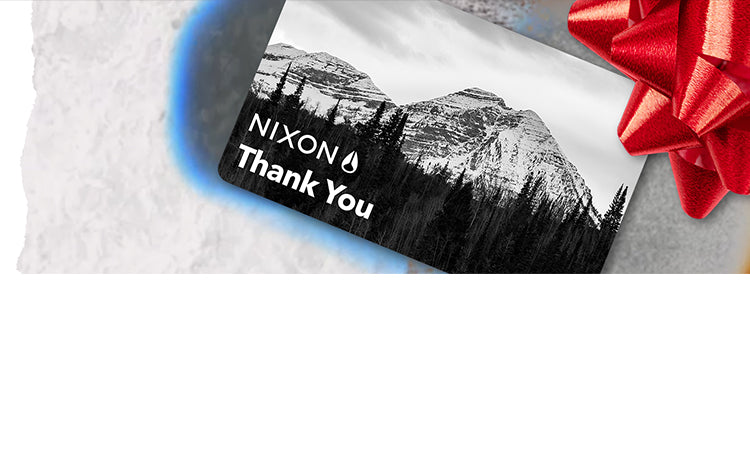 image of Nixon e gift card and red ribbon for holiday gifting. 