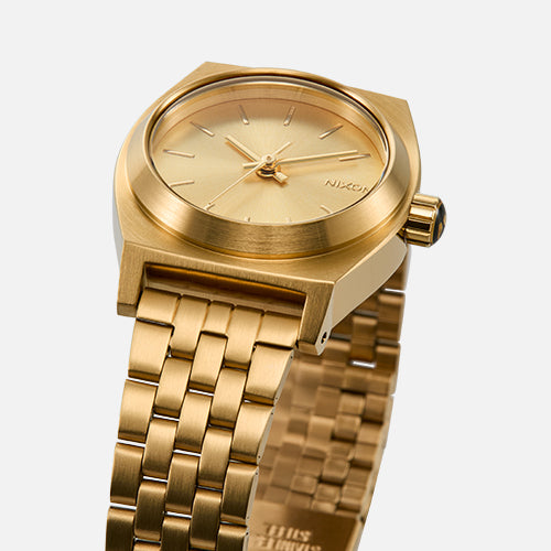 Small gold Nixon Time Teller watch for women
